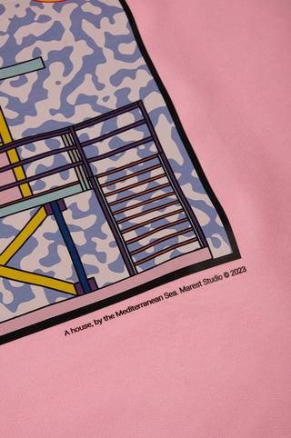 Détail en gros plan du motif imprimé éclatant sur le Women's Antonyo Marest x Trendsplant Oversized Hoodie en Gum Pink, mettant en valeur des éléments artistiques sur un fond rose pâle. | TP_IMAGE_TYPE=DETAIL