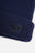 Détail en gros plan du Campana Cuff Beanie en bleu marine, mettant en valeur la texture côtelée et le logo éléphant brodé. | TP_IMAGE_TYPE=DETAIL