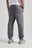 Persona che indossa Organic Essential Sweatpants Thunderstorm, vista posteriore | TP_IMAGE_TYPE=MODEL_BACK