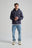 Personne portant un Organic Essential Zip Hoodie en Trendsplant Blue, vue de face | TP_IMAGE_TYPE=MODEL_FRONT