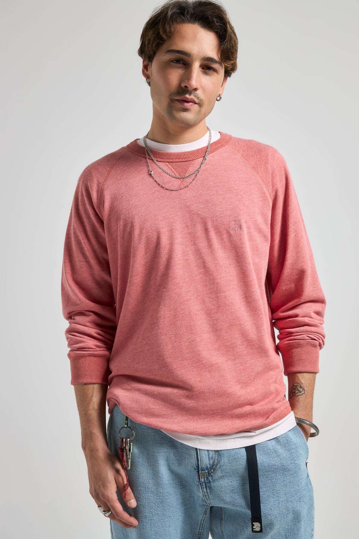 Person wearing an Essential Lightweight Sweatshirt in Salty Red front view | TP_IMAGE_TYPE=MODEL_FRONT