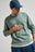 Personne portant un Essential Lightweight Sweatshirt en Salty Green, vue de face | TP_IMAGE_TYPE=MODEL_FRONT