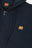 Vue de détail de l'Organic Essential Zip Hoodie en Trendsplant Blue, montrant la fermeture à glissière et le logo éléphant brodé | TP_IMAGE_TYPE=DETAIL