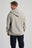 Persona che indossa Essential Sunwashed Zip Hoodie in Natural Gray, vista di spalle | TP_IMAGE_TYPE=MODEL_BACK