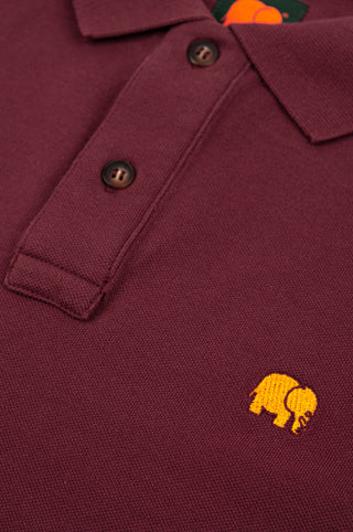 Dettaglio ravvicinato della Polo Shirt Essentials Organic Burgundy con bottoni e logo elefante ricamato | TP_IMAGE_TYPE=DETAIL