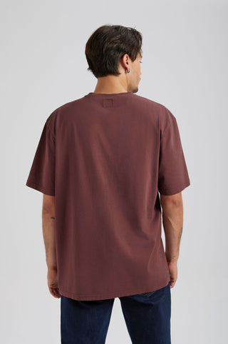 Person wearing Essential T-Shirt in Puce Purple, back view | TP_IMAGE_TYPE=MODEL_BACK