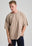 Personne portant un Essential Oversized T-Shirt en Moon Rock Grey, avec une coupe ample et un look décontracté. | TP_IMAGE_TYPE=MODEL_FRONT