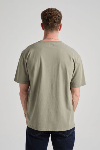Person wearing an Agave Green Essential T-Shirt, back view | TP_IMAGE_TYPE=MODEL_BACK
