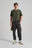 Person wearing an Organic Essential T-Shirt Kombu Green front view | TP_IMAGE_TYPE=MODEL_FRONT