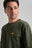 Person wearing an Organic Essential T-Shirt in Kombu Green, front view | TP_IMAGE_TYPE=MODEL_FRONT