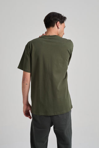 Person wearing an Organic Essential T-Shirt in Kombu Green, back view | TP_IMAGE_TYPE=MODEL_BACK