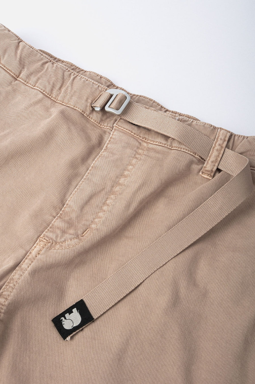 Detail view of Ecodye Cotton Climber Pant in Sand, highlighting the waistband and label | TP_IMAGE_TYPE=DETAIL