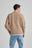 Persona che indossa un maglione Sella Knit Nomad Brown, vista posteriore | TP_IMAGE_TYPE=MODEL_BACK