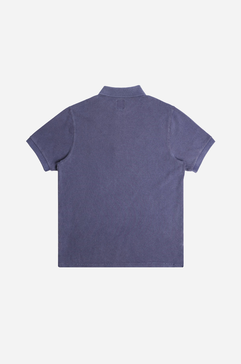 Back view of an Organic Pigment Dyed Polo Shirt in Beacon Blue | TP_IMAGE_TYPE=MODEL_BACK
