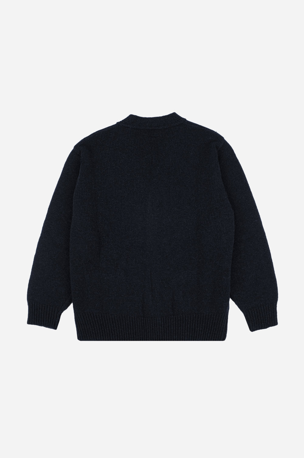 Relleu Cardigan en Dark Navy visto desde la espalda, mostrando su diseño de punto texturizado y su corte relajado. | TP_IMAGE_TYPE=MODEL_BACK