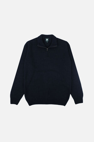 Bernia Quarter Zip Knit en bleu océan, montrant la vue de face du pull avec un col à fermeture zippée. | TP_IMAGE_TYPE=SILHOUETTE_FRONT