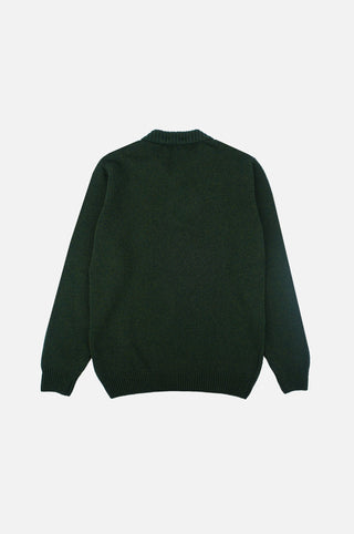 Bernia Quarter Zip Knit en coloris Forest, présenté de dos, montrant son col et ses manches côtelés. | TP_IMAGE_TYPE=MODEL_BACK