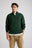 Personne portant le Bernia Quarter Zip Knit en Forest, debout dans une pose décontractée | TP_IMAGE_TYPE=MODEL_FRONT