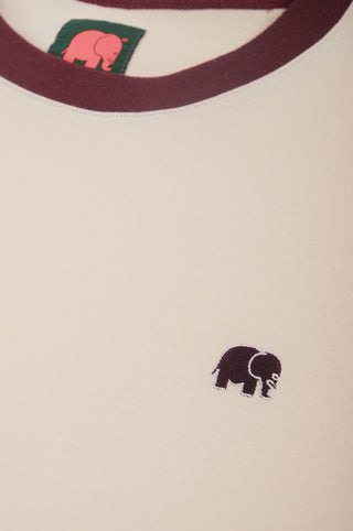 Close-up detail of Color Block T-Shirt in Pale Glow and Iron Veil featuring a small elephant logo | TP_IMAGE_TYPE=DETAIL