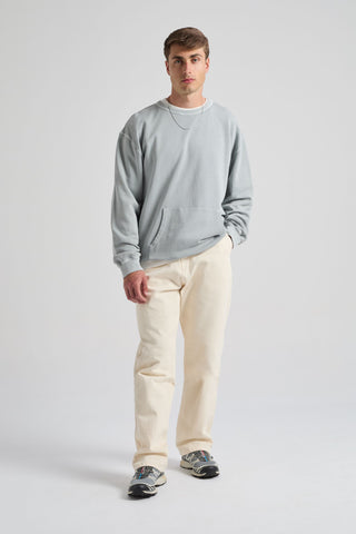 Personne portant le pantalon Operator Relaxed Pants en coloris Antique White, vue de face | TP_IMAGE_TYPE=MODEL_FRONT