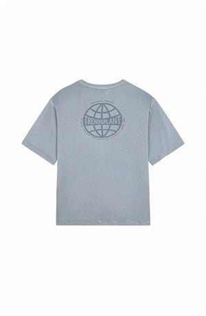 T-shirt Worldwide Sunwashed Heavy Oversized en Quarry Blue vu de dos, avec un design de logo représentant un globe | TP_IMAGE_TYPE=MODEL_BACK