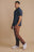 Personne portant une Organic Essential Polo Shirt en Trendsplant Blue, vue de face | TP_IMAGE_TYPE=MODEL_FRONT