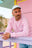 Persona che indossa un Essential Sweatshirt in Gum Pink, vista frontale | TP_IMAGE_TYPE=MODEL_FRONT