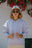 Persona che indossa una Women's Organic Essential Oversized Hoodie Lavender, vista frontale | TP_IMAGE_TYPE=MODEL_FRONT