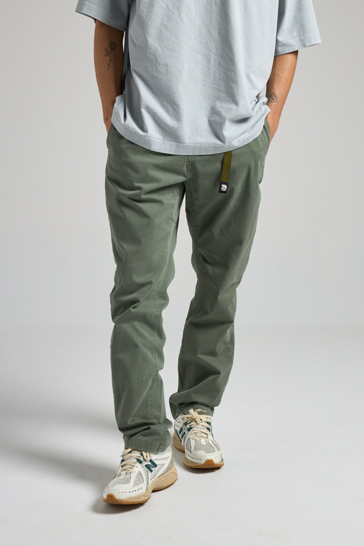 Person wearing Ecodye Cotton Climber Pant in Menthol front view | TP_IMAGE_TYPE=MODEL_FRONT